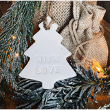 Personalised Christmas clay tags.