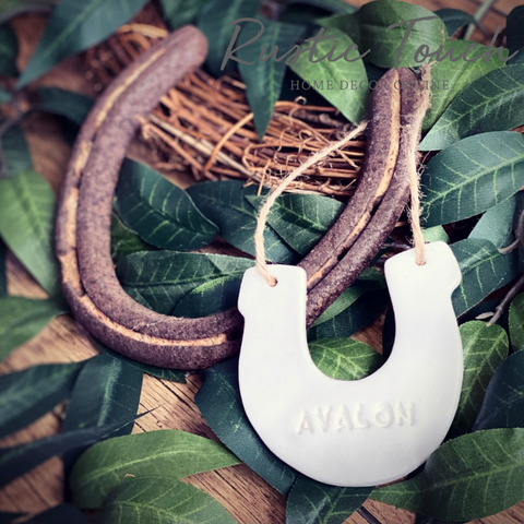 Horseshoe personalised clay tag.