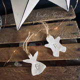 Personalised Christmas clay tags.