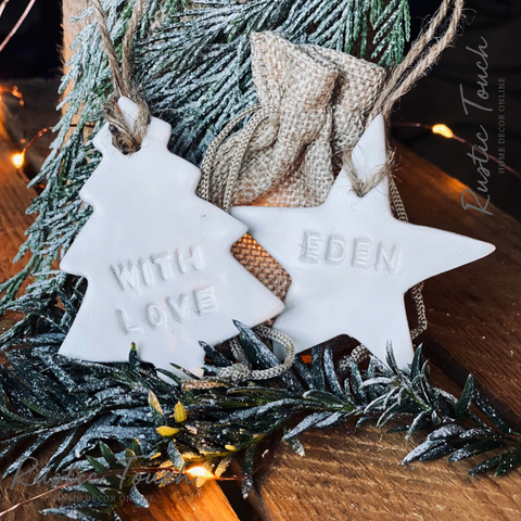Personalised Christmas clay tags.