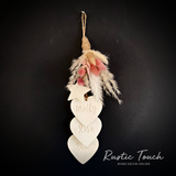 Bunch of personalised clay hearts.