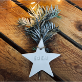 Personalised Christmas clay tags.